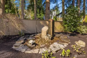 Water Feature Adjacent to Custom Stone Patio
