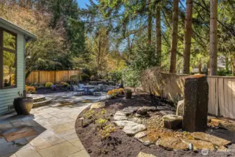 Water Feature Adjacent to Custom Stone Patio