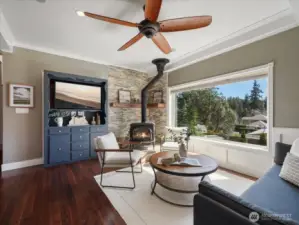 Right as you step into the house. So much natural light and a wood burning fireplace.