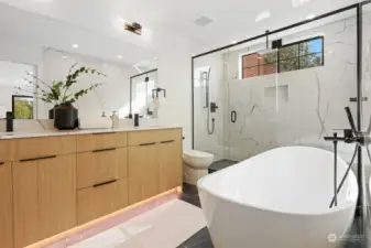 Resort Like Private Suite Bath with under-cabinet Lighting, Freestanding Tub