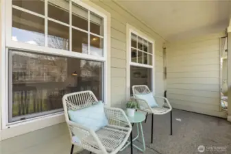 The covered front porch provides welcoming space to enjoy the neighborhood.