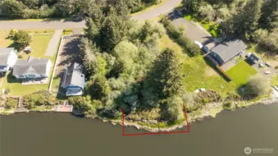 A view from the canal side looking back towards the road.  Red line is Approximate location of the lot.
