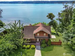 Beautiful West facing home with decks on both levels.  Sunset Views!