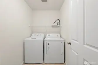 Personal laundry room off of bedrooms upstairs, making laundry easily accessible.