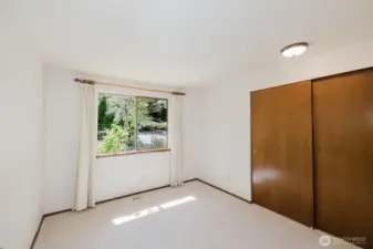 With 3 bedrooms plus a den/office space, you have plenty of options! You can choose the room to convert to your den/office. All the rooms are functional and attractive, with closets, and all the rooms provide an intimate look out to the gardens and outdoor spaces. Or it could be repurposed as a guest room, but could also function as your home office, media or craft room...so many choices!