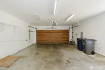 Extra large attached 2 car garage with automatic garage door opener.