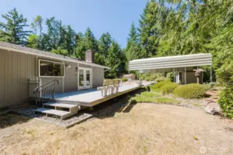 Set on a shy acre of serene Northwest beauty, there’s plenty of space to garden, relax, or entertain outdoors.