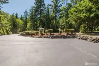 Freshly sealed drive, leads to the two car attached garage.
