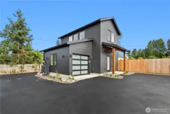 New, solid construction with metal roof & covered porch