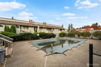Spacious pool area for lounging in the sun.
