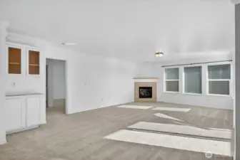 Cabinets for storage or office area. Primary bedroom through door.