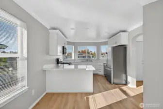 Looking into the kitchen from the dining area.
