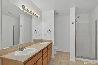 Primary Ensuite Bathroom with double sinks.