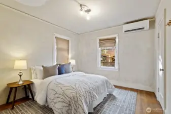 One of two bright and cheery bedrooms on the main level.