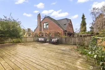 Summer relaxation and BBQs with friends await on this huge sun-soaked deck.