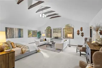 Guest bedroom retreat has an enormous walk-in closet and access to the deck.