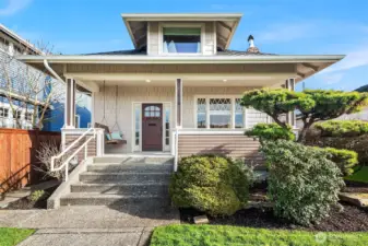 Front steps leading to covered porch.