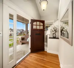 Foyer creating seamless flow between upstairs and main level.