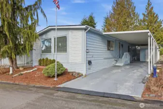 driveway room for two cars and entrance to home
