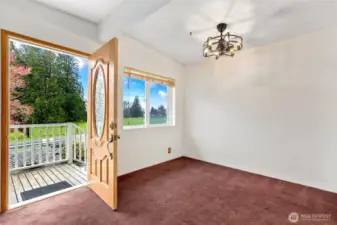 Dining Area w/ view of the Valley and city lights off in the distance.