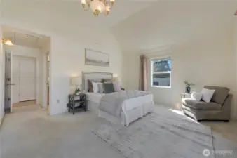 Primary bedroom with south-facing window