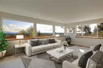 Spacious main-level living room with panoramic water and mountain views.