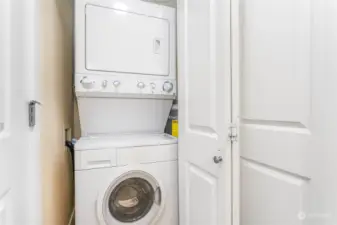 Convenient, in-unit stack washer/dryer behind the bi-folds. You'll notice the new water heater peeking out of the closet inside to the right.