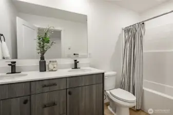 Photos shown are of a similar floor plan previously built in a different neighborhood (The Ridge in Blaine). Finishes and features may vary. Some items pictured reflect buyer-selected upgrades which are not included in the base price and may be added at an additional cost.