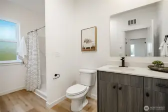 Photos shown are of a similar floor plan previously built in a different neighborhood (The Ridge in Blaine). Finishes and features may vary. Some items pictured reflect buyer-selected upgrades which are not included in the base price and may be added at an additional cost.