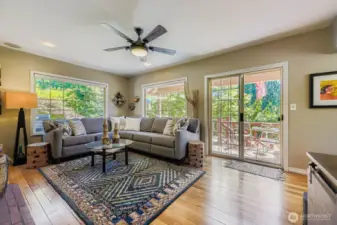 Living room with connecting S facing entertainment size deck