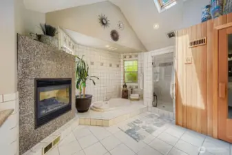 Enormous primary bath with propane fireplace. jetted tub & sauna - like having a spa in your home