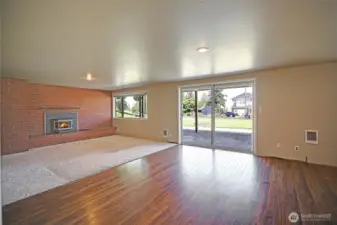 Lower level living room w/ patio.