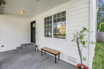 Inviting covered entry, perfect for welcoming guests and enjoying year-round.