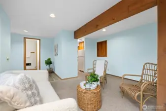 Looking across the living area toward the bath and the kitchen.