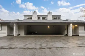 There are two parking spaces to the right side of the carport and a large storage closet to the rear.