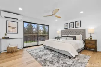 Owner Suite on main floor is a retreat to relax! Slider to deck & gorgeous en-suite bathroom!