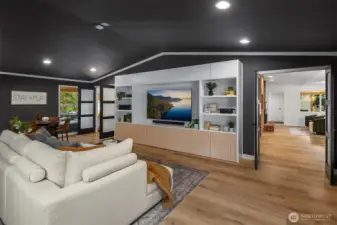 Large bonus room with built-in media storage, perfect for movies, play space or lounging