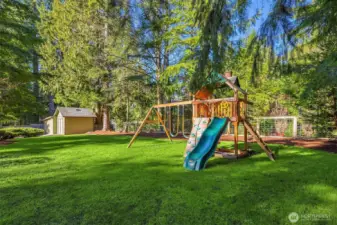 Fully fenced yard offers space to play, garden or explore!