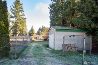 Gated lot, can drive an RV or trailer to stay in while building a home.