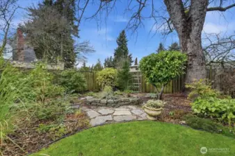 Whimsical, charming, enchanting back yard awaits!