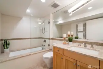 Updated full bathroom with marble floors