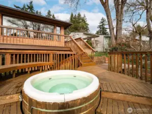 Explore multi level deck and private cedar wrapped hot tub!