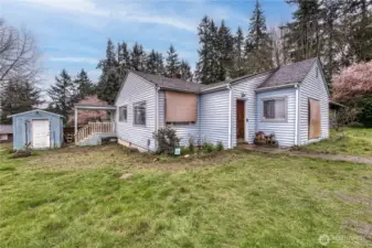 One story home on large corner lot near historic downtown Port Orchard.  Outbuilding is finished with cadet heat.