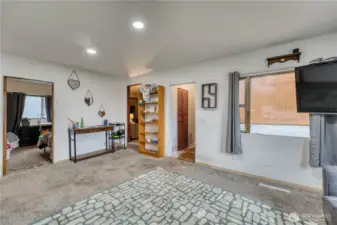 Family room with updated can lighting.