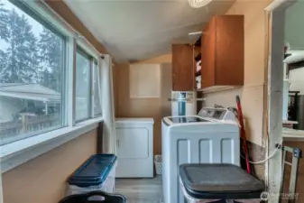 Laundry room located at the back of the home.