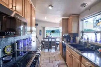 Granite countertops and stainless-steel appliances.