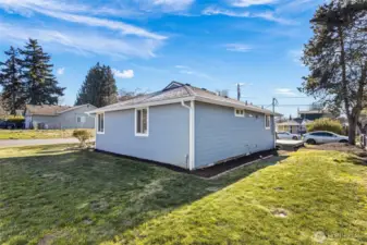 Looking from the garage to house.  Adding a privacy fence will create the private back yard oasis with room for fire pit, gardening or space to add on.