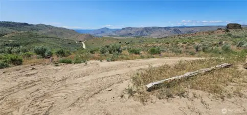 Building Site 2 in June - Upper portion of acreage near northern property line circular driveway