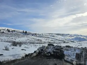 Looking SE in the winter from well site building pad.