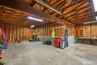 Shop area in garage, room for toys & projects